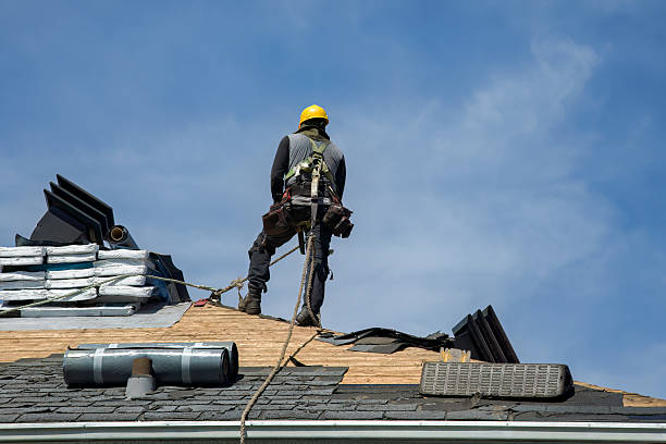 Professional Storm Damage Roof Repair technician working in Oakhurst, NJ